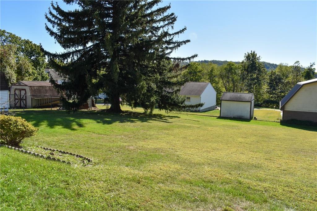 1149 Highland Avenue Vandergrift, PA 15690 - Photo 39 of 41 a backyard of a house with lots of green space