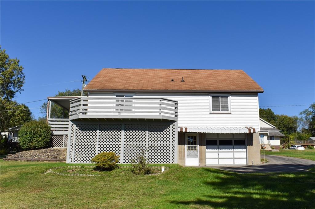 1149 Highland Avenue Vandergrift, PA 15690 - Photo 40 of 41 a front view of a house with a yard