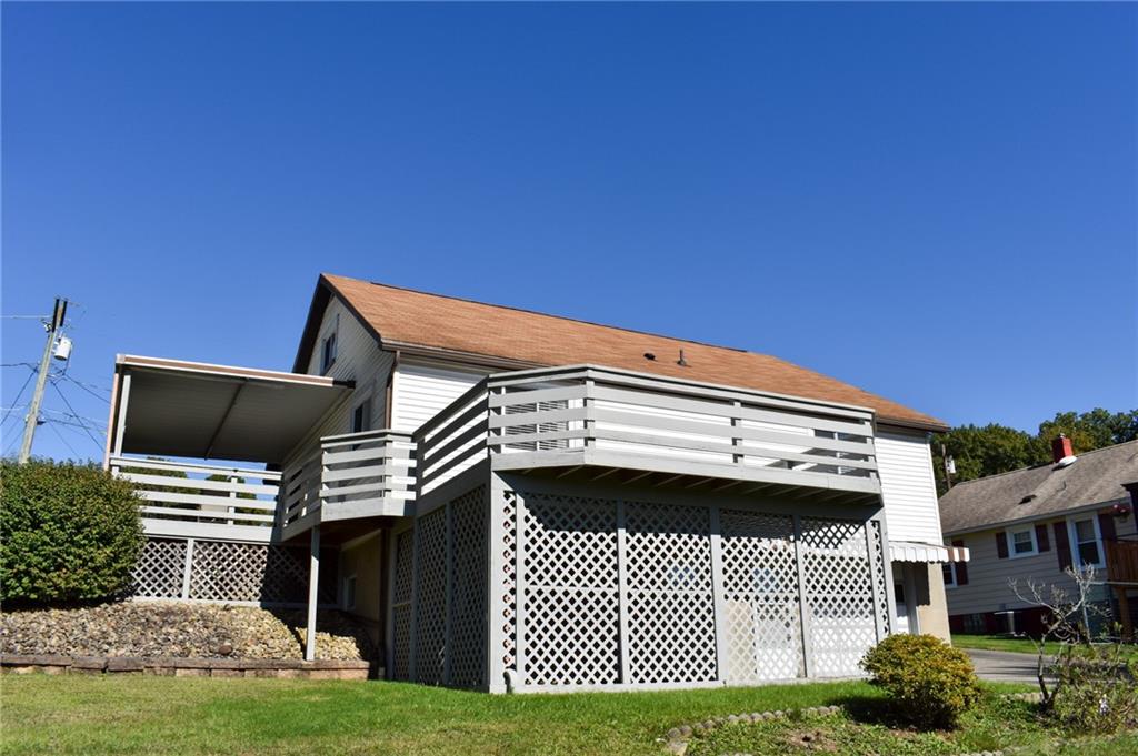 1149 Highland Avenue Vandergrift, PA 15690 - Photo 41 of 41 a front view of a house with a garden