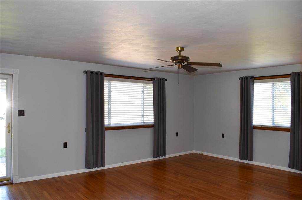 1149 Highland Avenue Vandergrift, PA 15690 - Photo 5 of 41 a view of a big room with wooden floor and windows