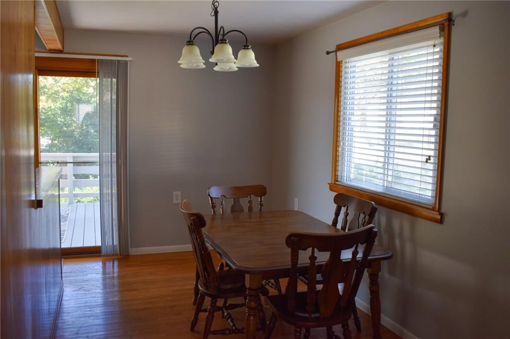 1149 Highland Avenue Vandergrift, PA 15690 - Photo 7 of 41 a view of a dining room with furniture window and wooden floor