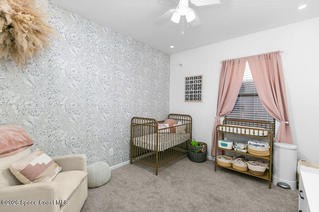 1209 Bolle Circle Rockledge, FL 32955 - Photo 18 of 28 a living room with furniture and a window