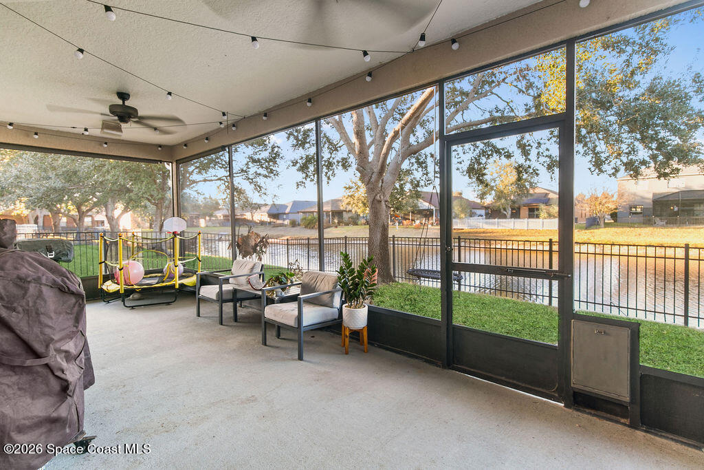 1209 Bolle Circle Rockledge, FL 32955 - Photo 24 of 28 a living room with furniture and windows
