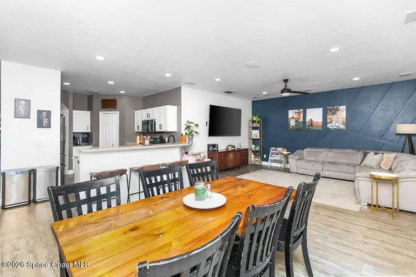 a view of a dining room with furniture