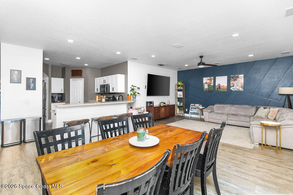 1209 Bolle Circle Rockledge, FL 32955 - Photo 7 of 28 a view of a dining room with furniture