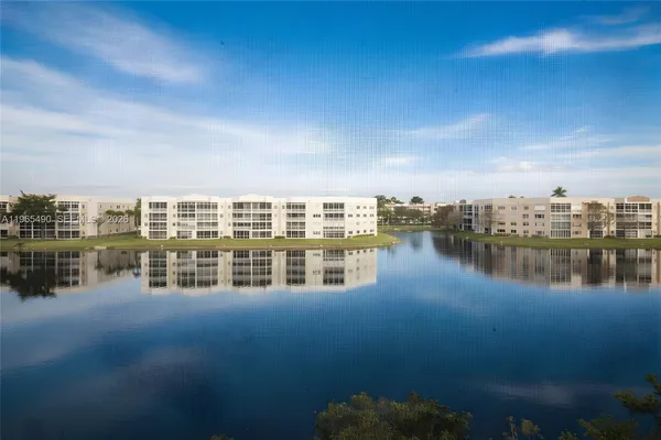 a view of a lake with city