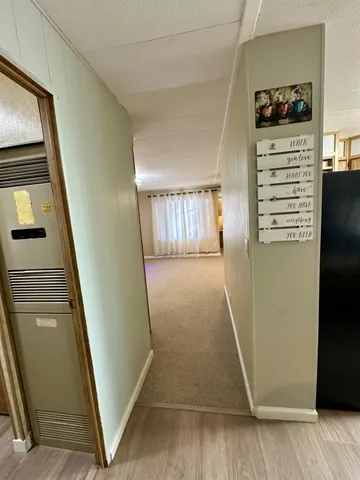 a utility room with cabinets washer and dryer