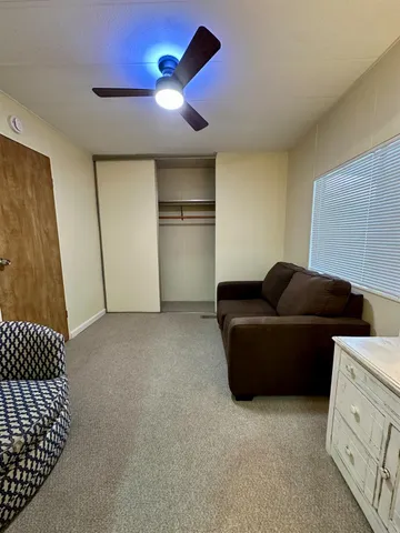 a bathroom with a tub and shower