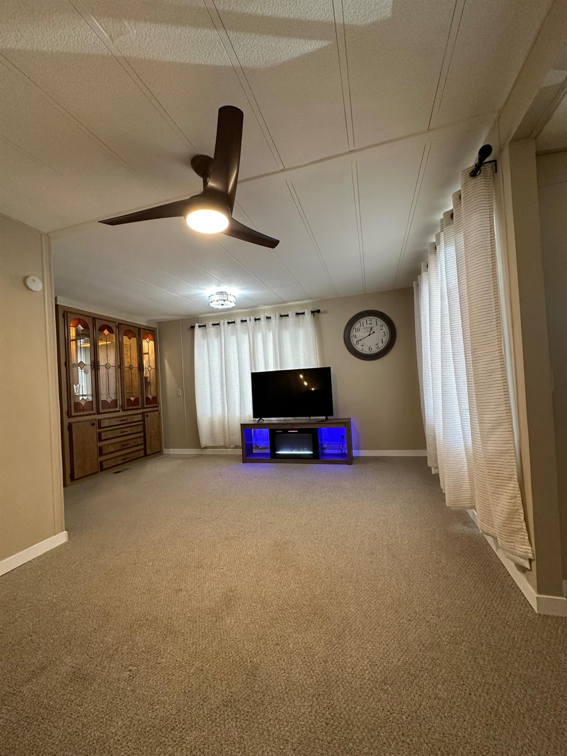 1200 South Carpenter Road, Unit 105 Modesto, CA 95351 - Photo 29 of 38 a view of a room with window and fireplace