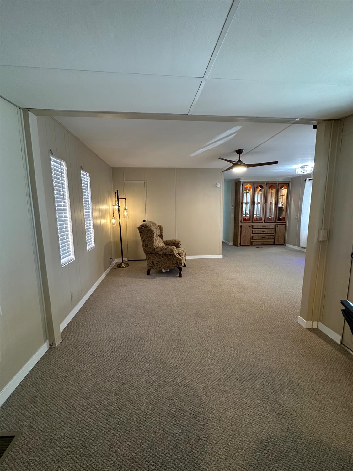 1200 South Carpenter Road, Unit 105 Modesto, CA 95351 - Photo 30 of 38 a view of a livingroom with a staircase