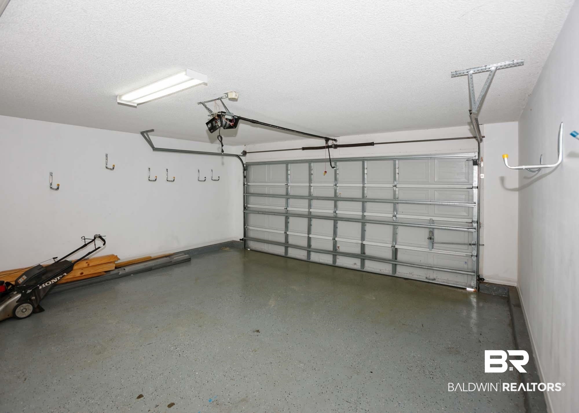 2530 Ashburn Lane Foley, AL 36535 - Photo 43 of 46 Garage featuring a garage door opener