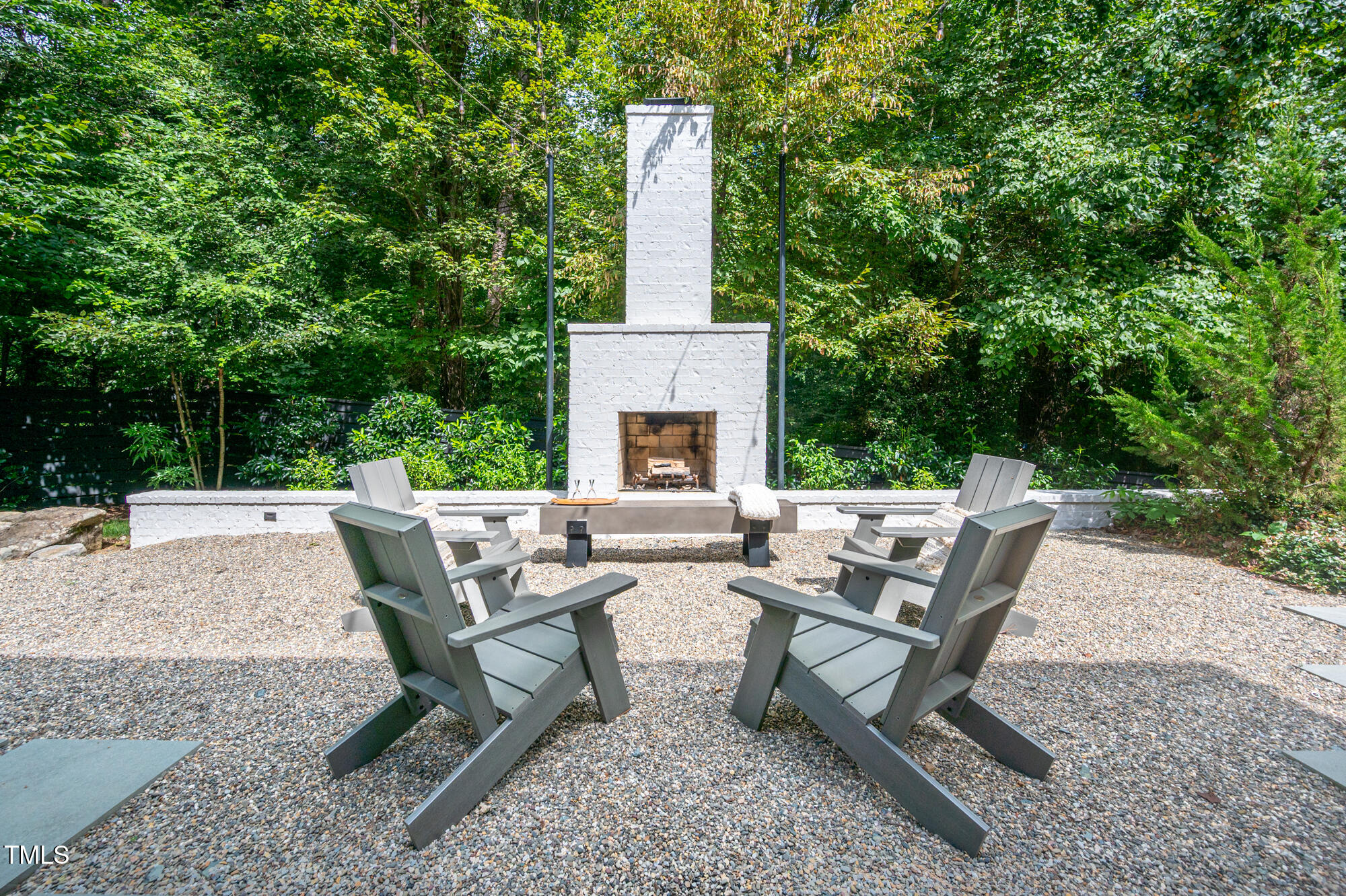 101 Botanical Way Chapel Hill, NC 27517 - Photo 45 of 61 a view of a patio with a table and chairs