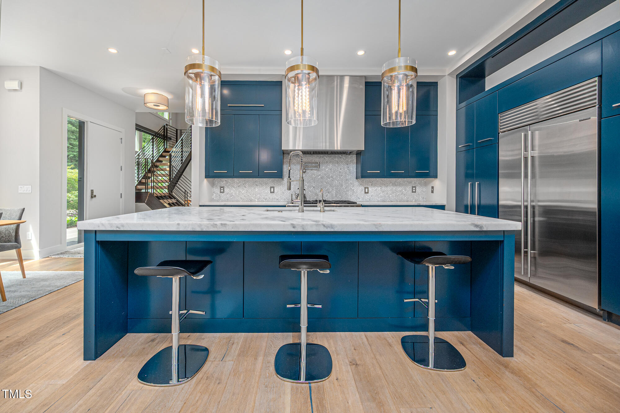 101 Botanical Way Chapel Hill, NC 27517 - Photo 6 of 61 a kitchen with a sink a counter space and stainless steel appliances