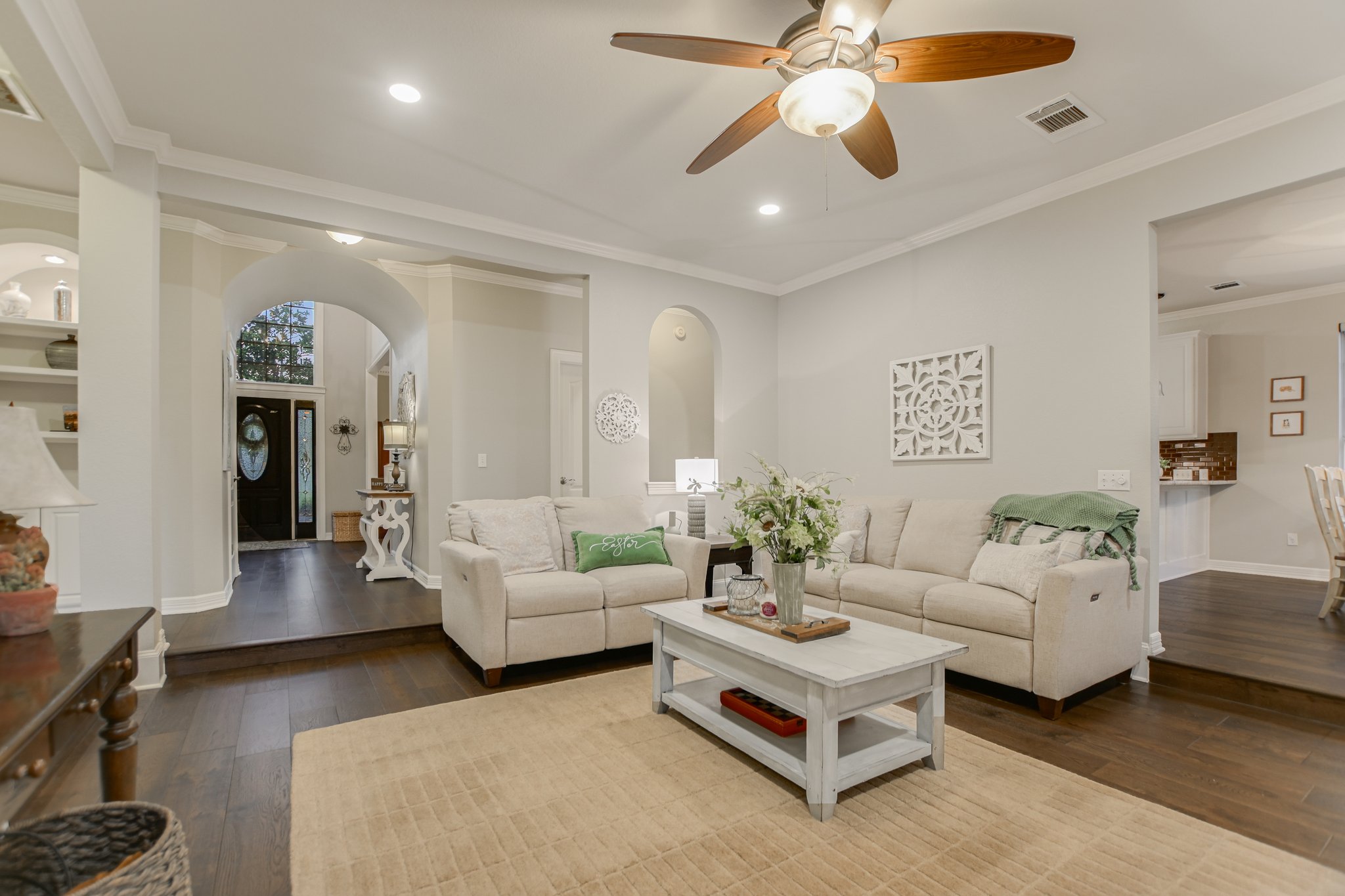 11100 Sheba Cove Austin, TX 78759 - Photo 13 of 29 a living room with furniture and a chandelier