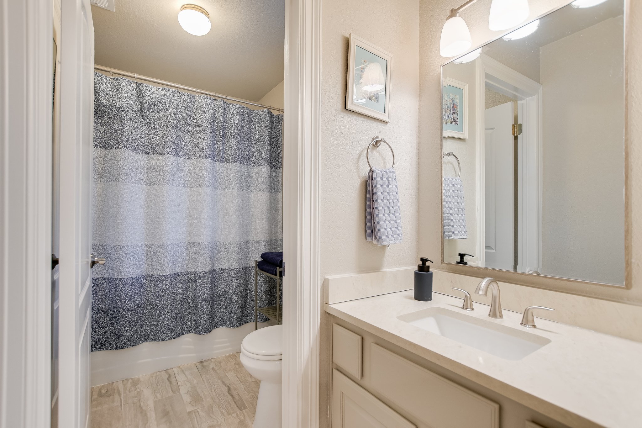 11100 Sheba Cove Austin, TX 78759 - Photo 23 of 29 a bathroom with a sink toilet and shower