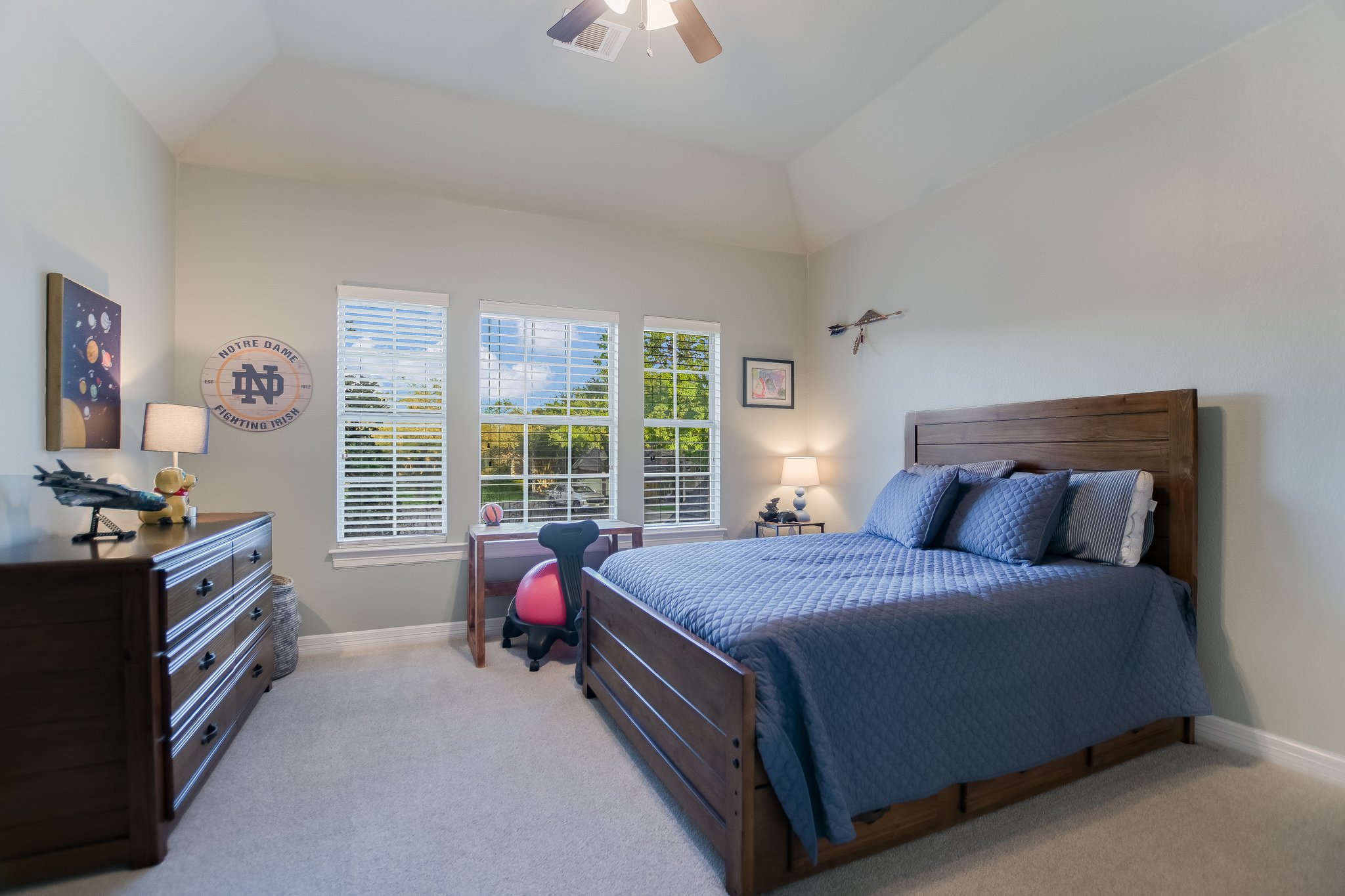 11100 Sheba Cove Austin, TX 78759 - Photo 24 of 29 a bedroom with a bed and a window