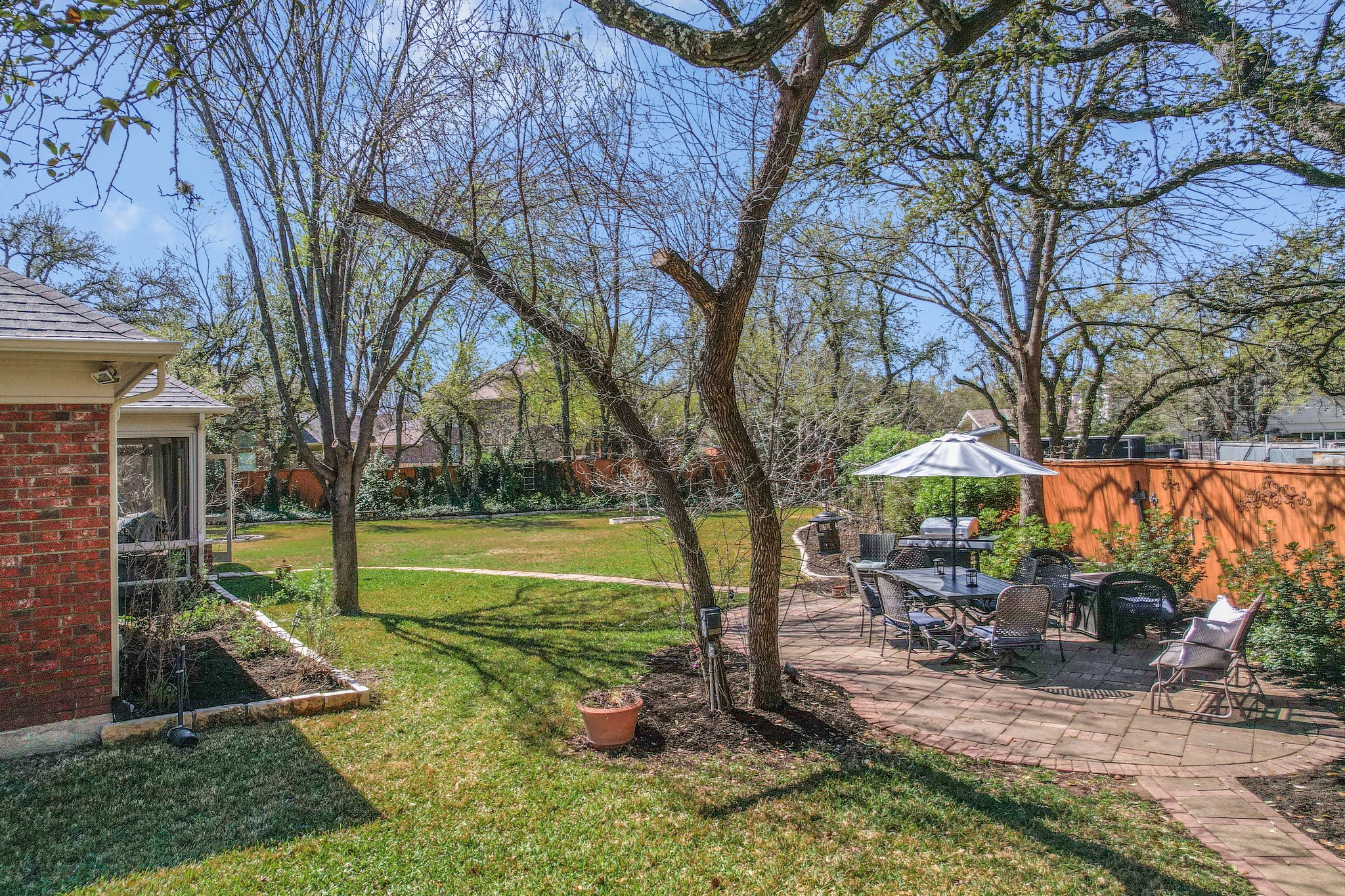 11100 Sheba Cove Austin, TX 78759 - Photo 25 of 29 a view of a house with backyard and a tree