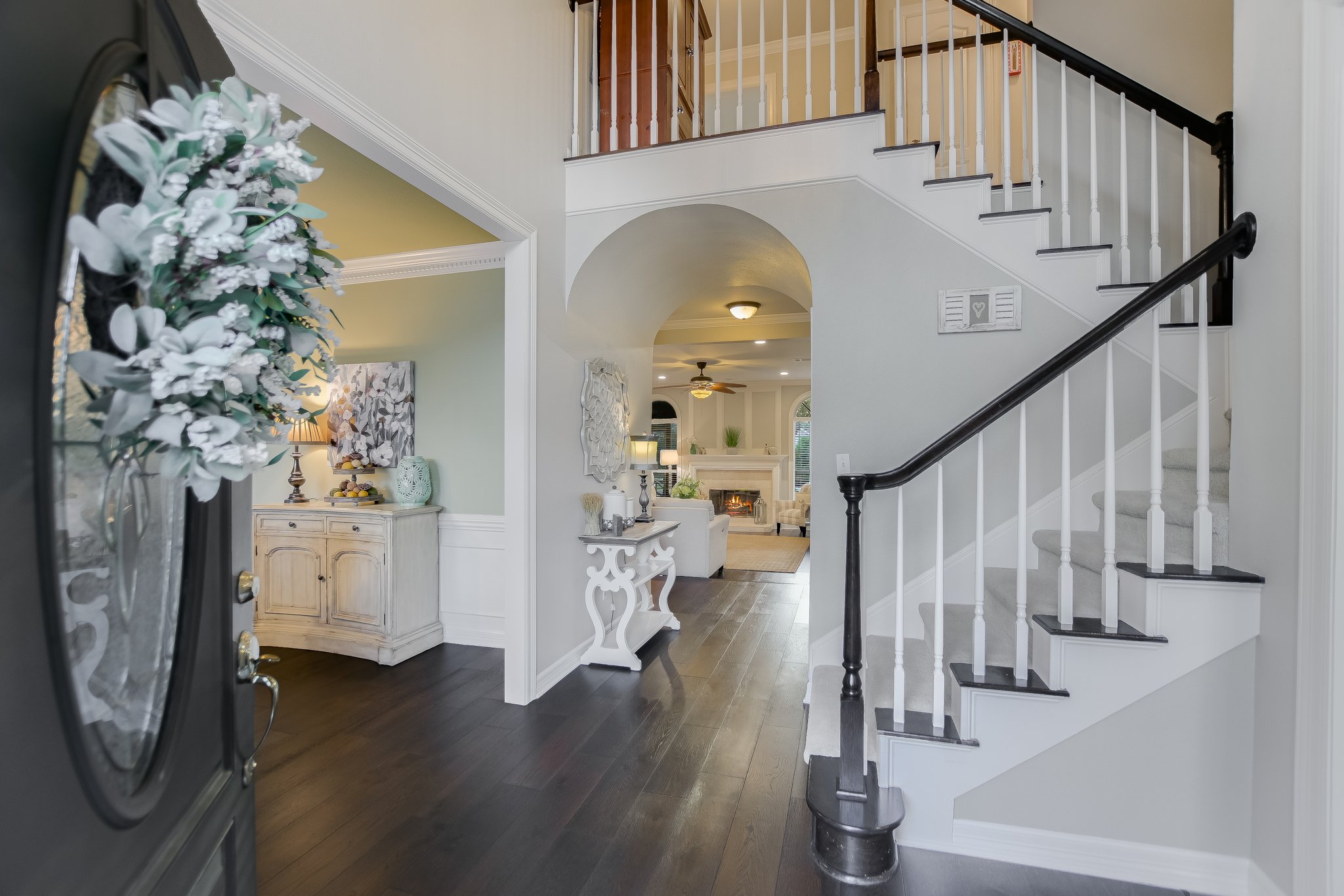 11100 Sheba Cove Austin, TX 78759 - Photo 28 of 29 a view of entryway with wooden floor and stairs