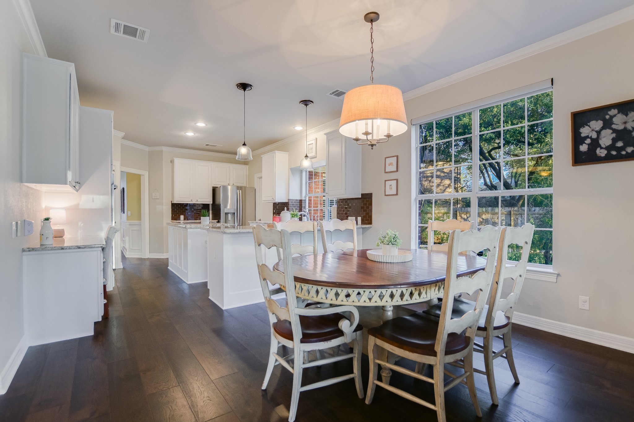 11100 Sheba Cove Austin, TX 78759 - Photo 5 of 29 a dining room with furniture window and wooden floor