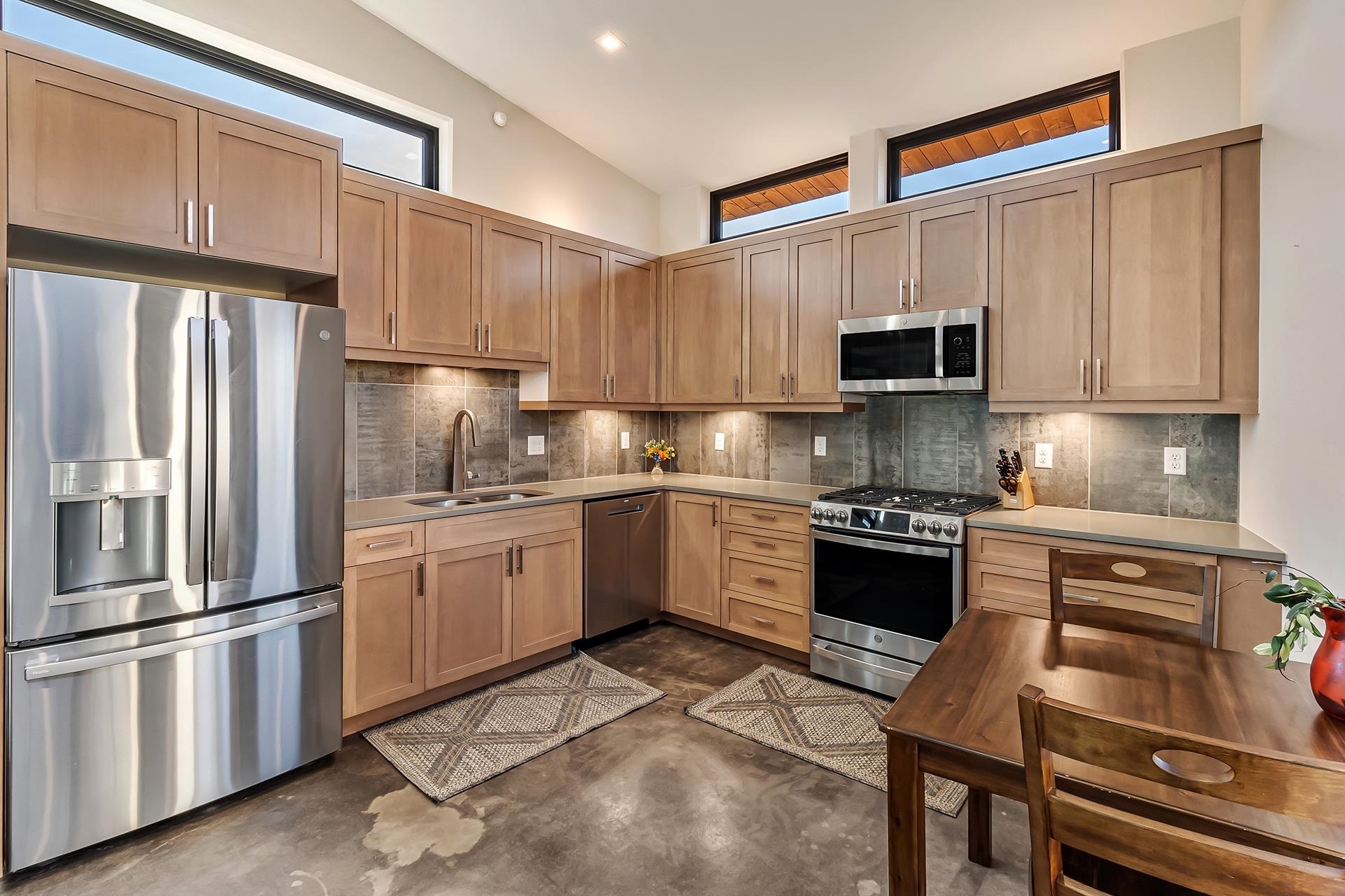 463 Red River Loop Clifton, CO 81520 - Photo 2 of 10 a kitchen with a refrigerator stove and sink