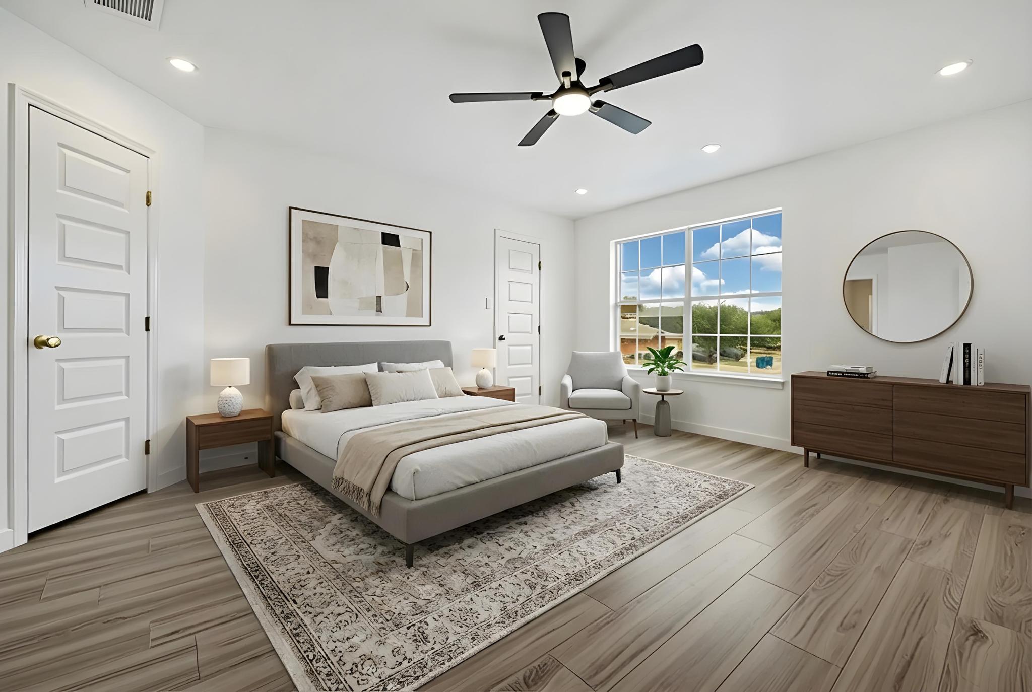 13501 Sierra Wind Lane Elgin, TX 78621 - Photo 16 of 19 Spacious room featuring wood-finish flooring, a large multi-pane window, recessed lighting, and a ceiling fan