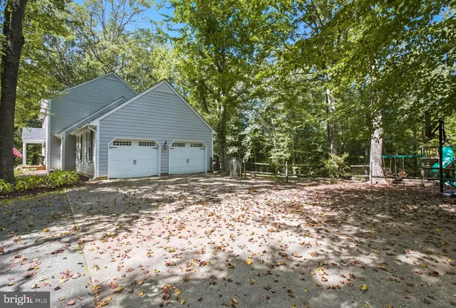 a house with a tree in the background