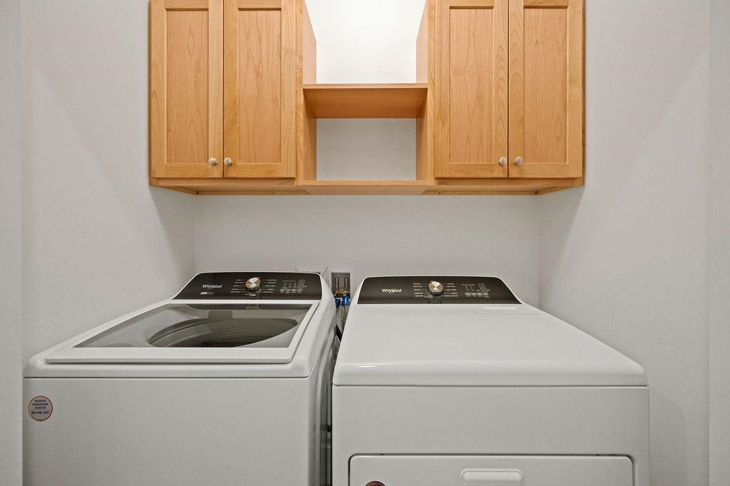 1243 Periwinkle Street Fruita, CO 81521 - Photo 24 of 24 a utility room with dryer and washer