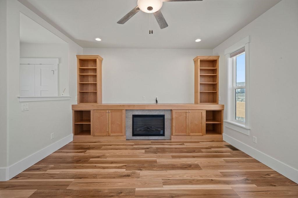 1243 Periwinkle Street Fruita, CO 81521 - Photo 9 of 24 a view of living room with furniture and window