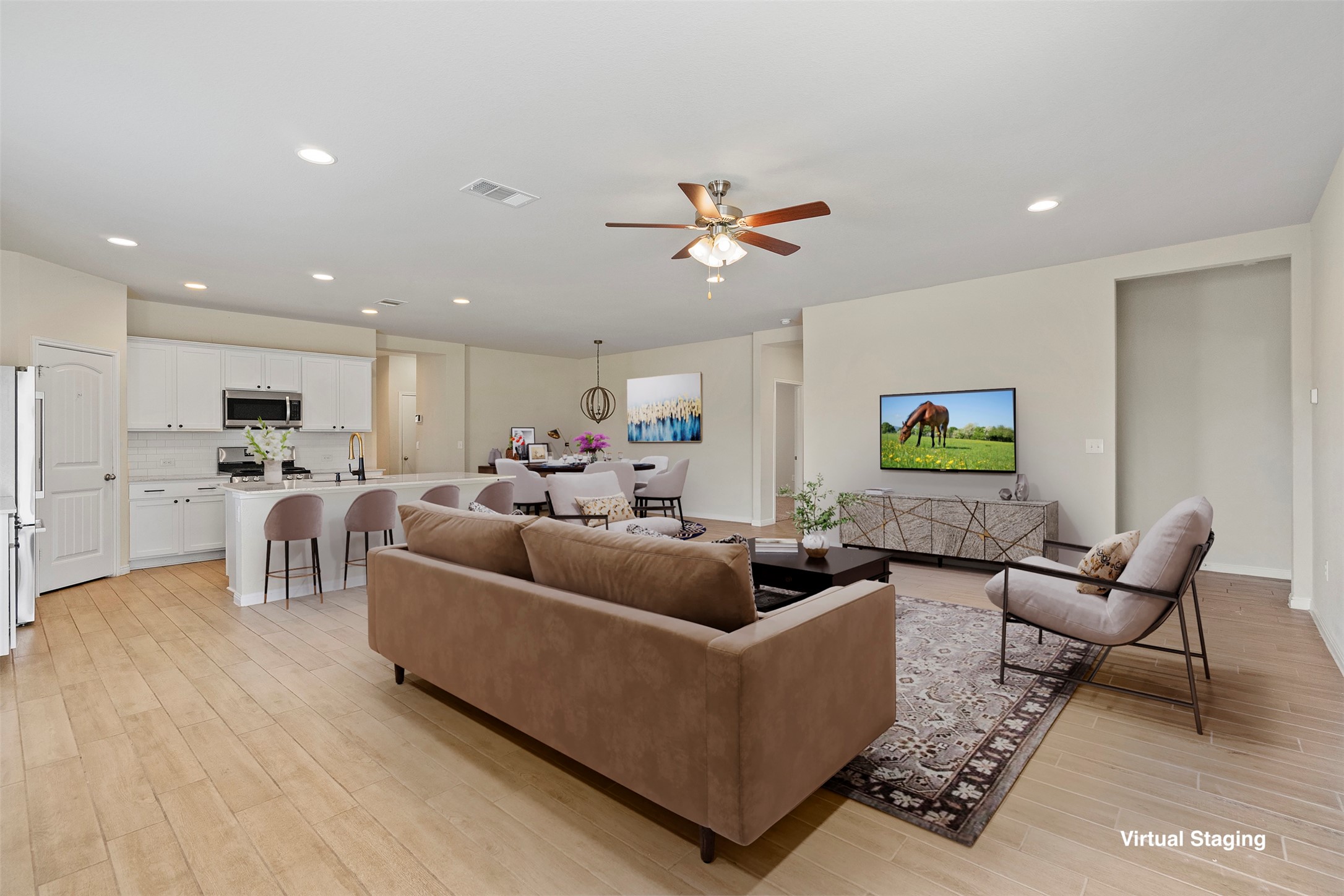 4125 Buffalo Ford Road Georgetown, TX 78628 - Photo 11 of 28 Living room with light wood-type flooring, a ceiling fan, and recessed lighting