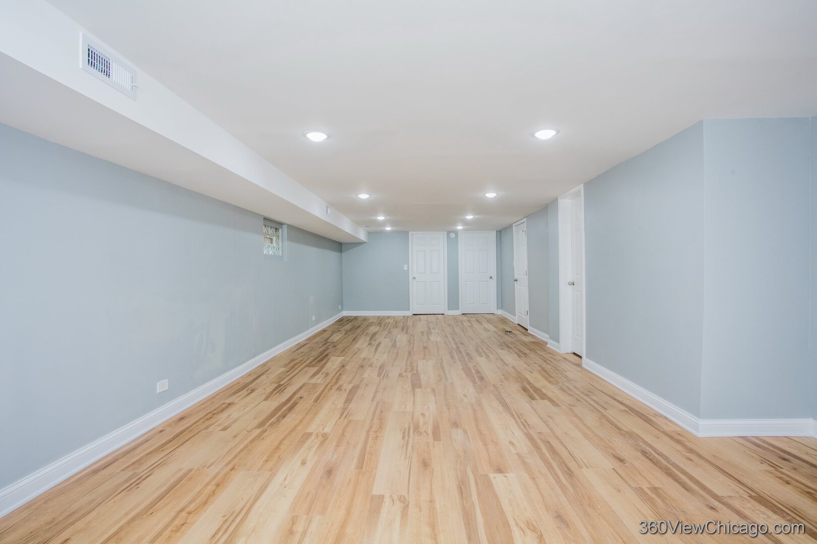 9015 South Carpenter Street Chicago, IL 60620 - Photo 14 of 23 a view of empty room with wooden floor