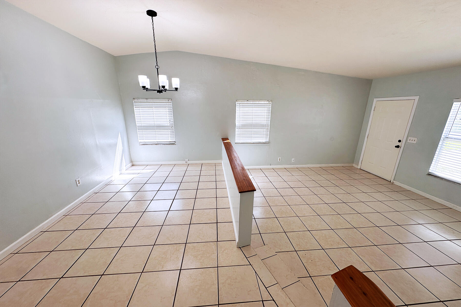 6171 Heather Street Jupiter, FL 33458 - Photo 12 of 22 a view of an empty room and window