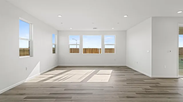 a view of an empty room and window