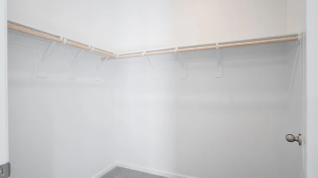 a bathroom with a double vanity sink mirror and shower