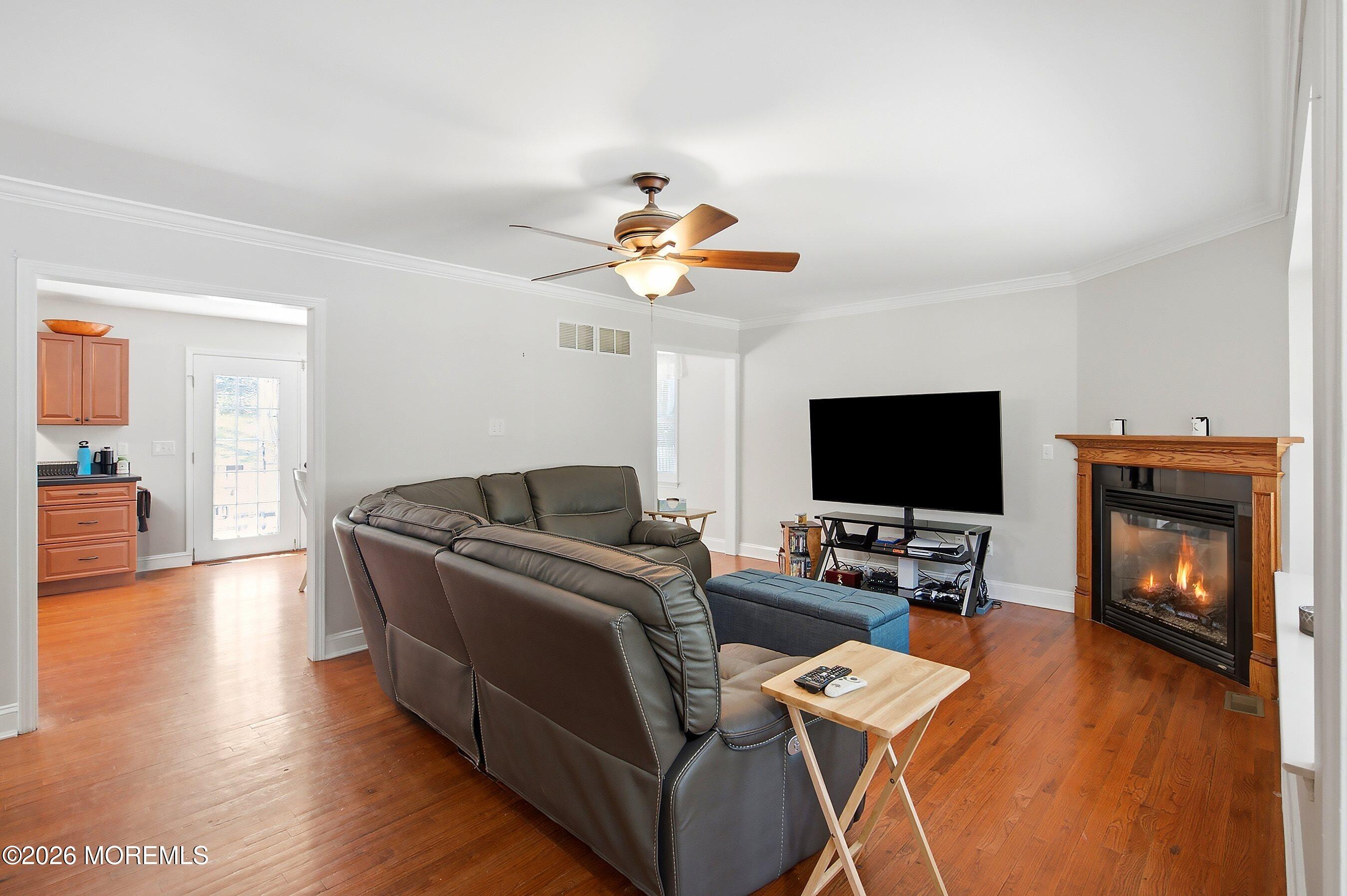 935 Bethel Church Road Jackson, NJ 08527 - Photo 6 of 32 a living room with furniture and a flat screen tv