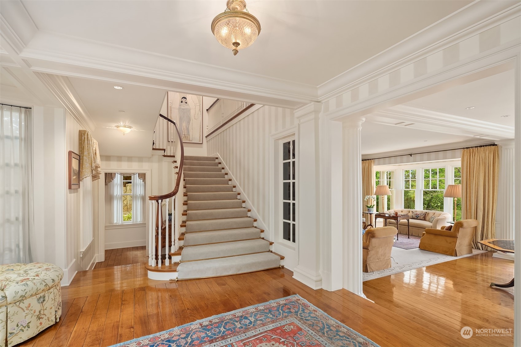 7002 North Mercer Way Mercer Island, WA 98040 - Photo 16 of 34 a view of entryway and hall with wooden floor