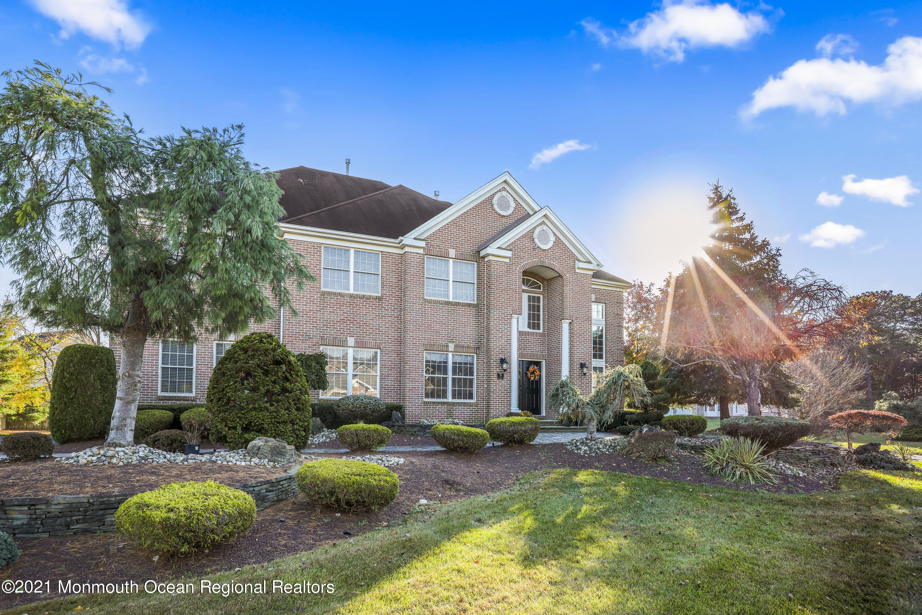 59 Mill Pond Road Jackson, NJ 08527 - Photo 1 of 30 a view of a house with backyard and sitting area