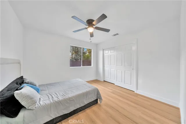 a view of room with hardwood floor