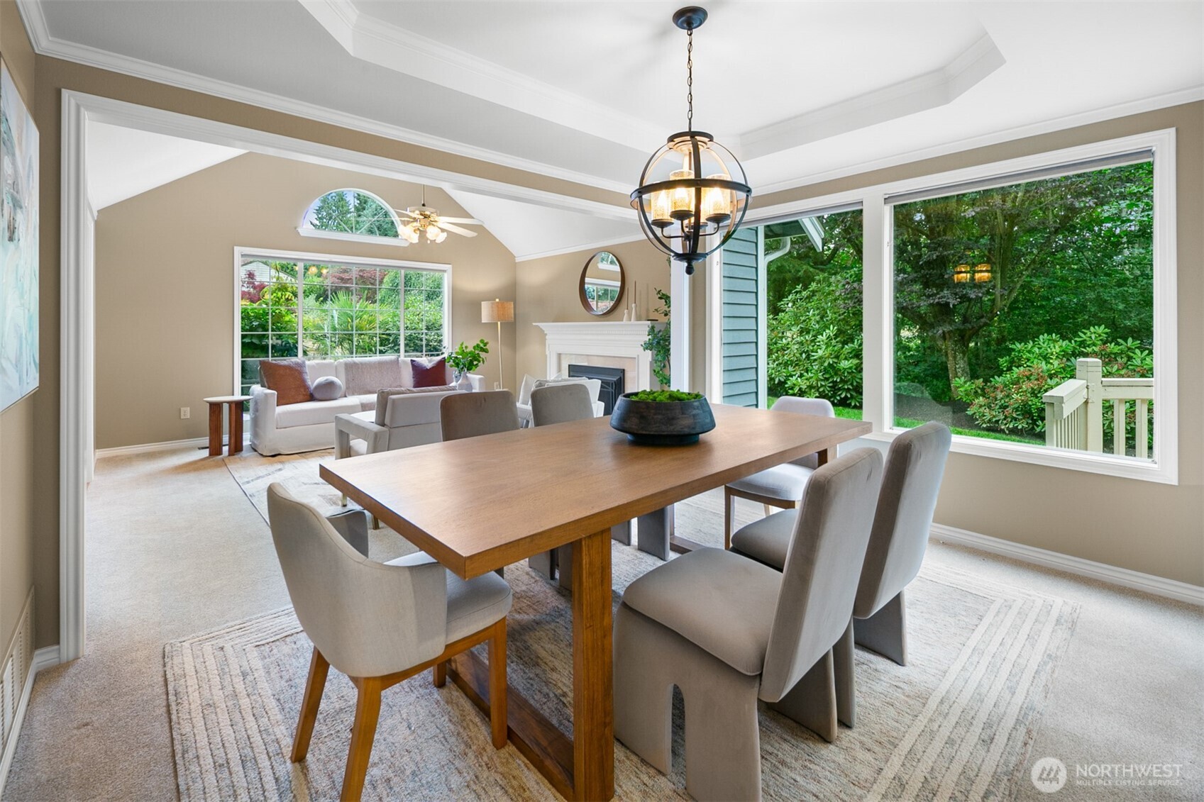 16116 68th Avenue West Edmonds, WA 98026 - Photo 11 of 40 a view of a dining room with furniture window and wooden floor
