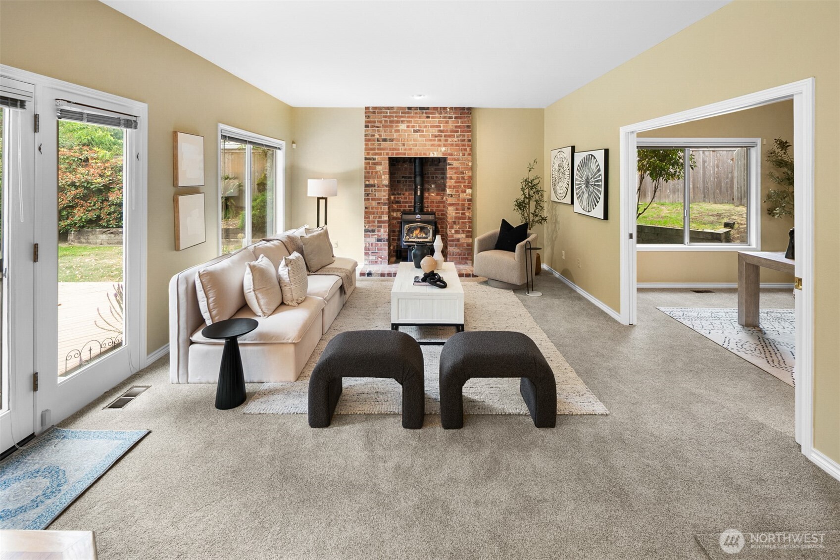 16116 68th Avenue West Edmonds, WA 98026 - Photo 12 of 40 a living room with furniture and a fireplace