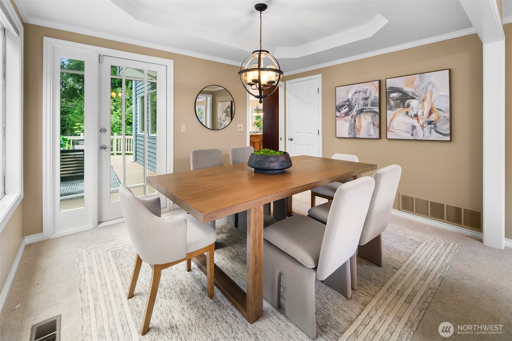 16116 68th Avenue West Edmonds, WA 98026 - Photo 17 of 40 a view of a dining room with furniture window and wooden floor