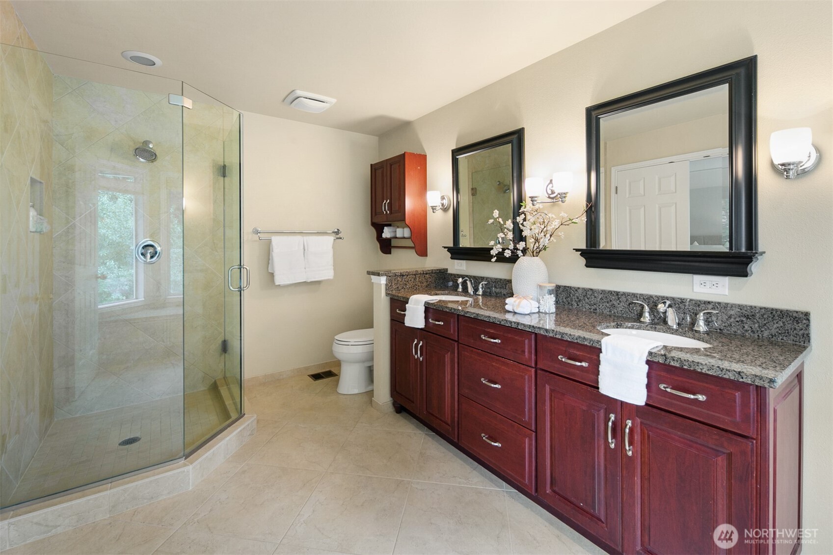 16116 68th Avenue West Edmonds, WA 98026 - Photo 21 of 40 a spacious bathroom with a double vanity sink mirror double shower and a