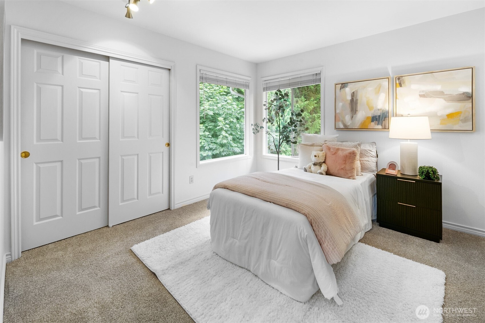 16116 68th Avenue West Edmonds, WA 98026 - Photo 27 of 40 a spacious bedroom with a bed and a window