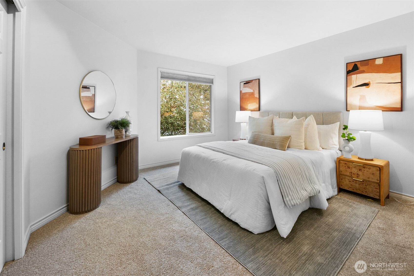 16116 68th Avenue West Edmonds, WA 98026 - Photo 28 of 40 a bed room with a bed and a potted plant