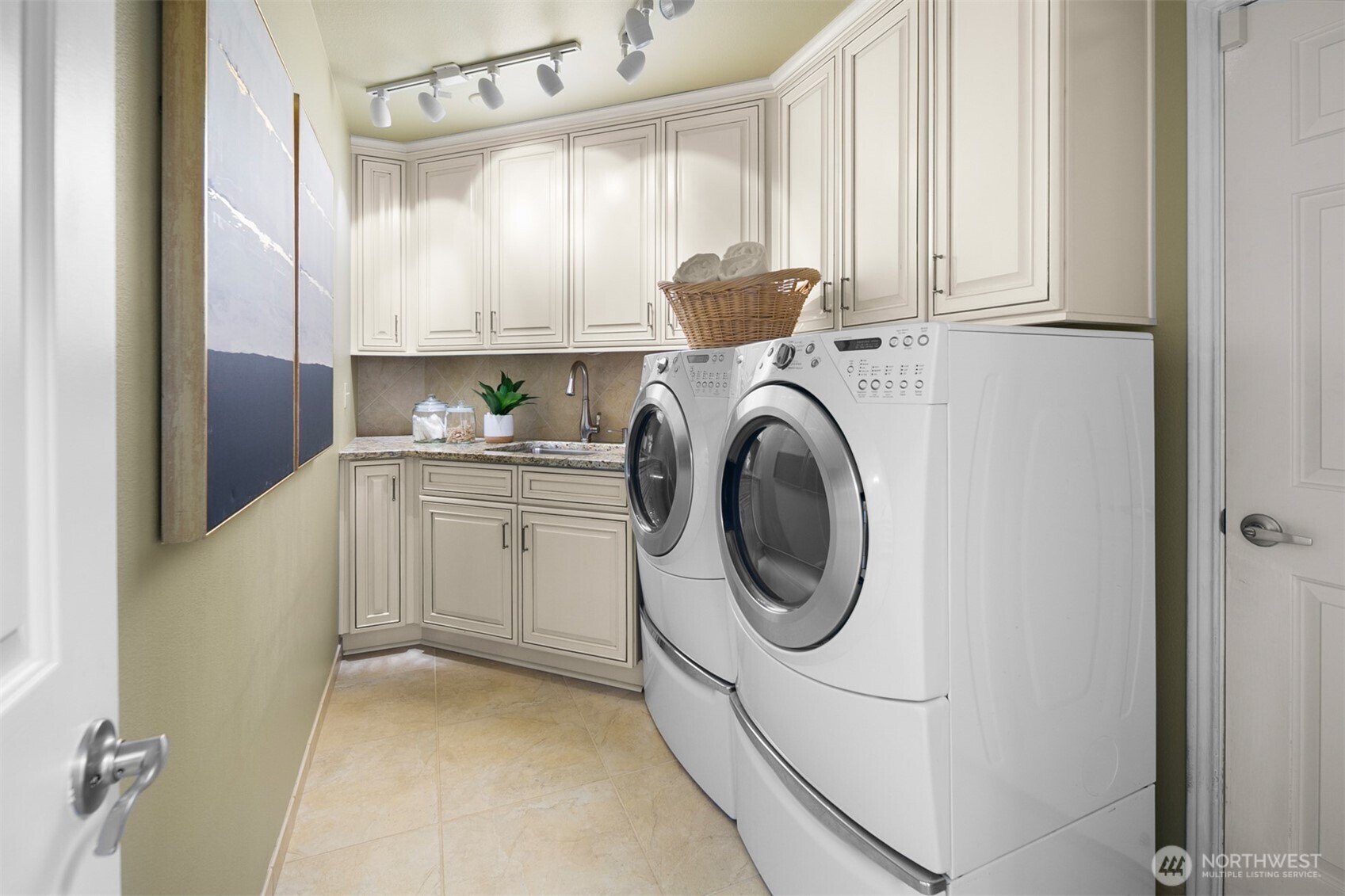 16116 68th Avenue West Edmonds, WA 98026 - Photo 31 of 40 a utility room with sink dryer and washer