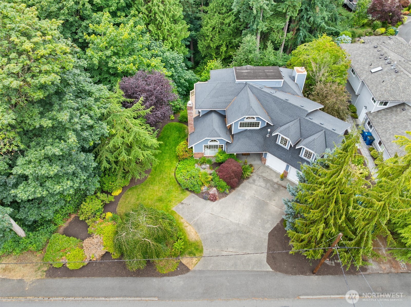16116 68th Avenue West Edmonds, WA 98026 - Photo 38 of 40 an aerial view of a house with a garden
