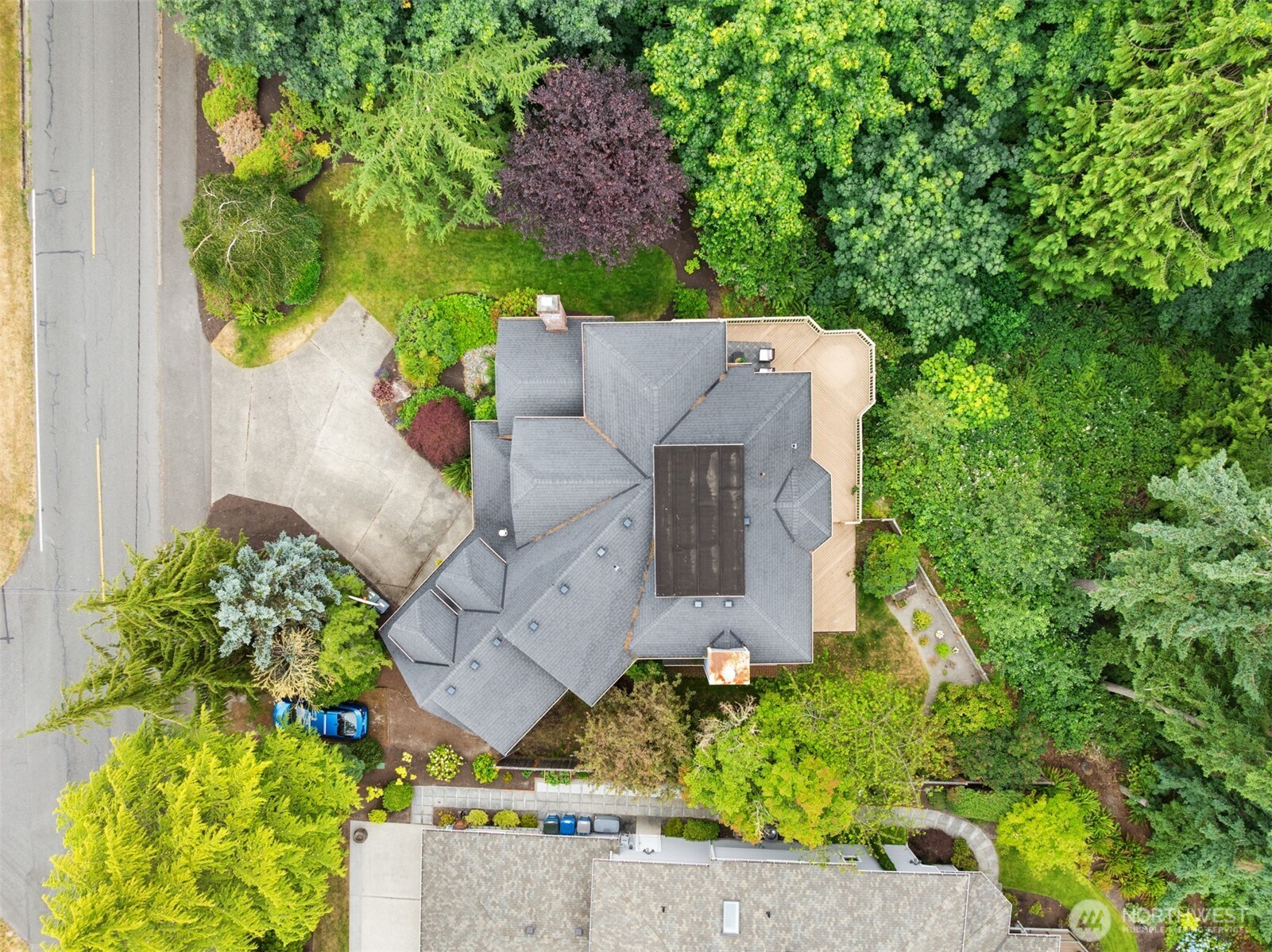 16116 68th Avenue West Edmonds, WA 98026 - Photo 39 of 40 an aerial view of a house with a yard and garden