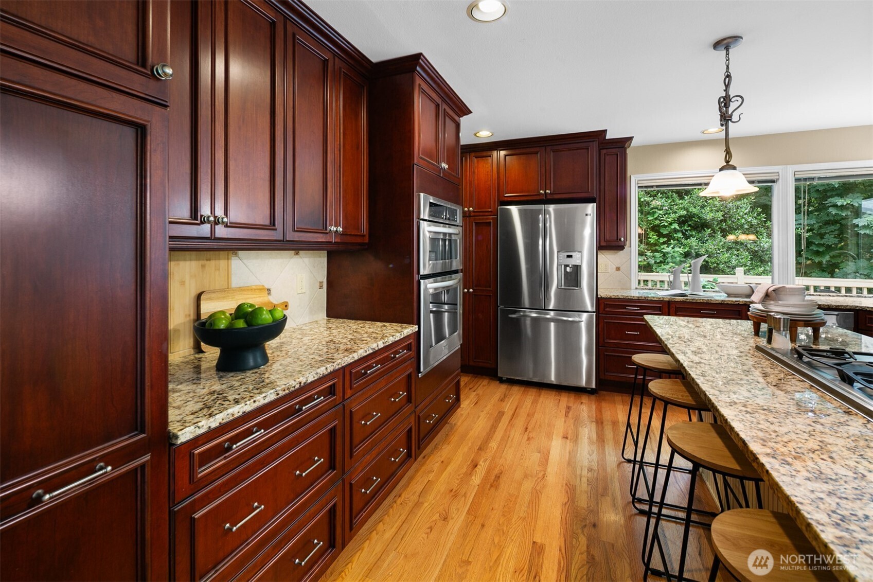 16116 68th Avenue West Edmonds, WA 98026 - Photo 9 of 40 a kitchen with stainless steel appliances granite countertop a refrigerator and a sink