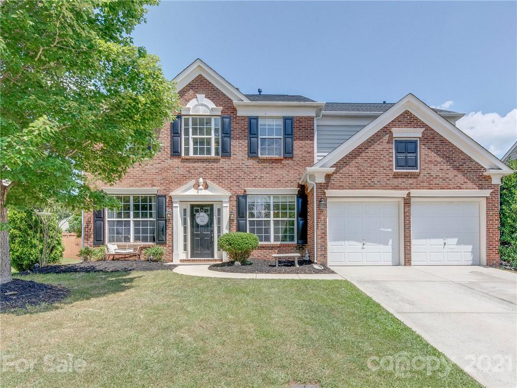 2405 Coltsgate Road Waxhaw, NC 28173 - Photo 1 of 48 front view of a house with a yard