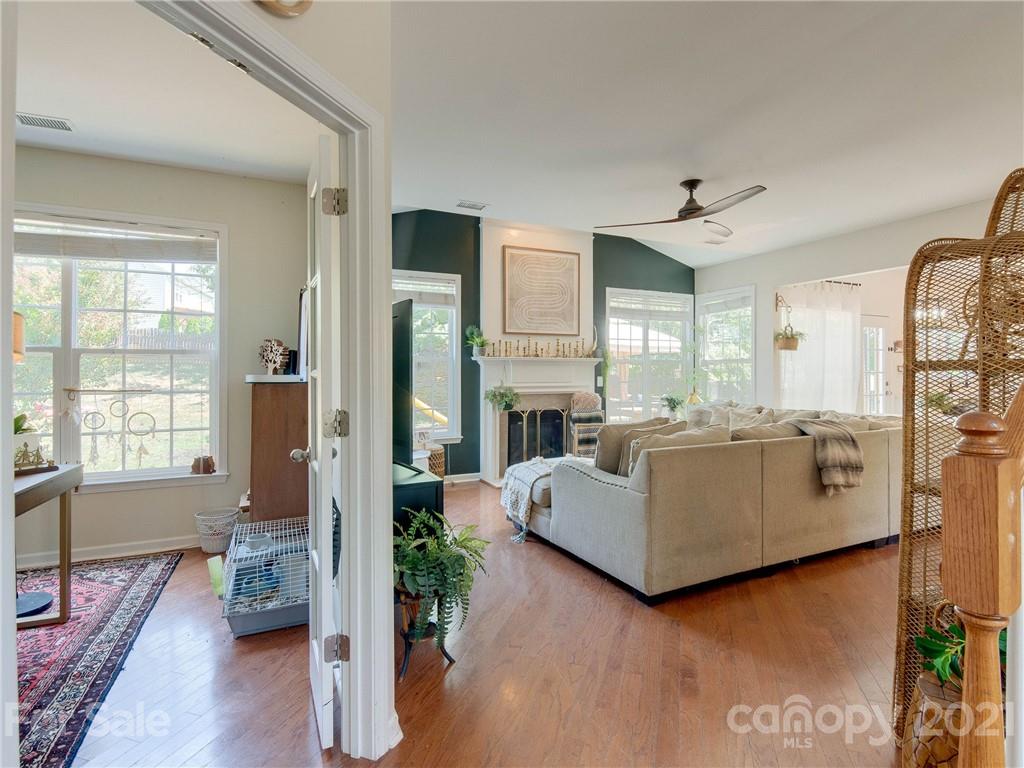 2405 Coltsgate Road Waxhaw, NC 28173 - Photo 12 of 48 a living room with furniture and a fireplace