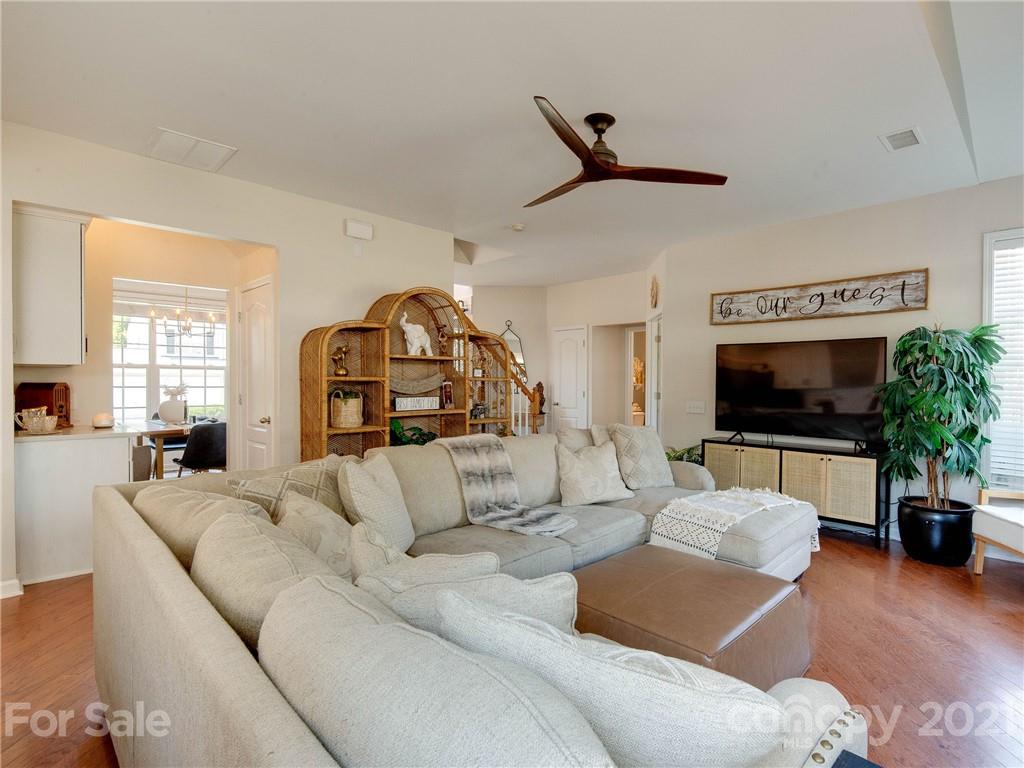 2405 Coltsgate Road Waxhaw, NC 28173 - Photo 16 of 48 a living room with furniture and a flat screen tv